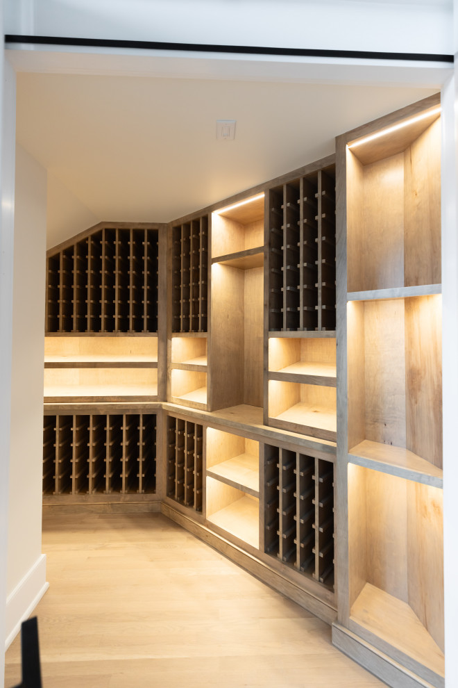 Example of a beach style wine cellar design in Nashville