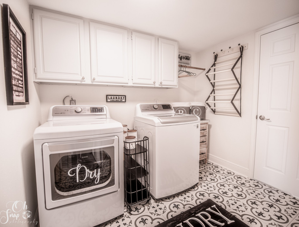 Design ideas for a small rural galley separated utility room in Houston with raised-panel cabinets, grey cabinets, white walls, porcelain flooring, a side by side washer and dryer and multi-coloured floors.