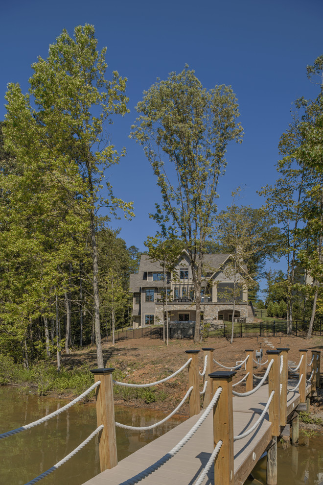 Example of a transitional home design design in Charlotte