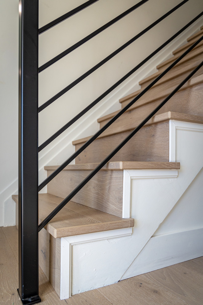 This is an example of an expansive modern staircase in Denver.