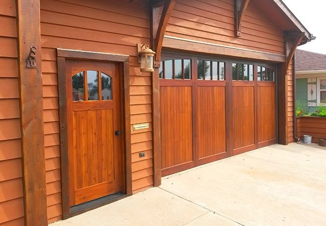 Inspiration for a small rustic front door remodel with a medium wood front door