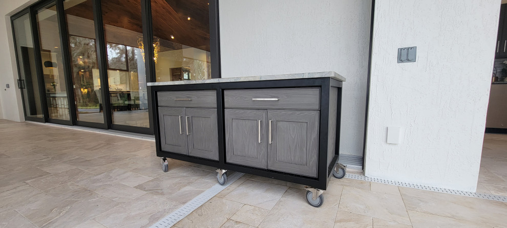 Mid-sized transitional backyard patio kitchen photo in Orlando
