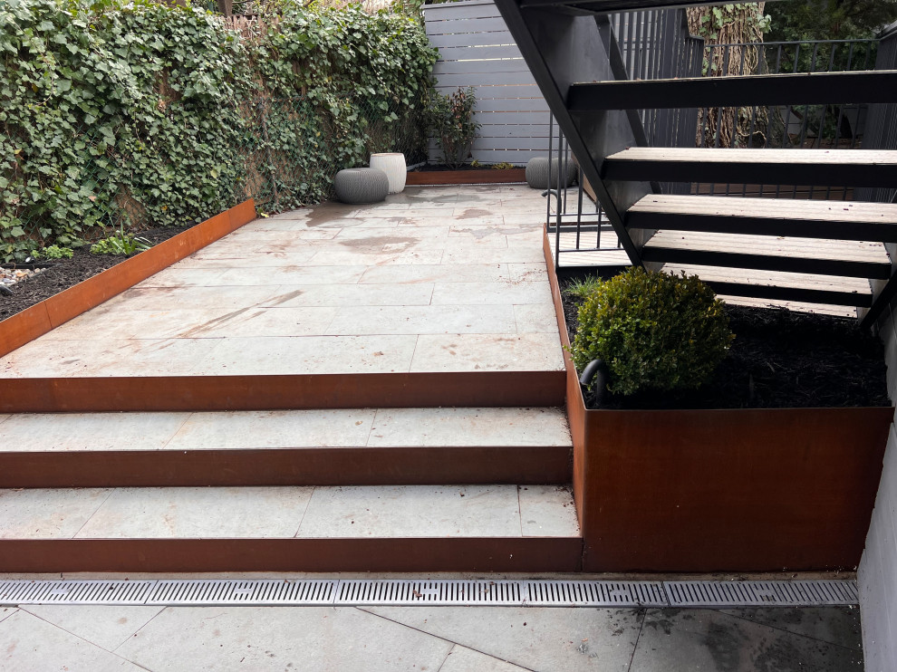 Park Slope backyard corten planters