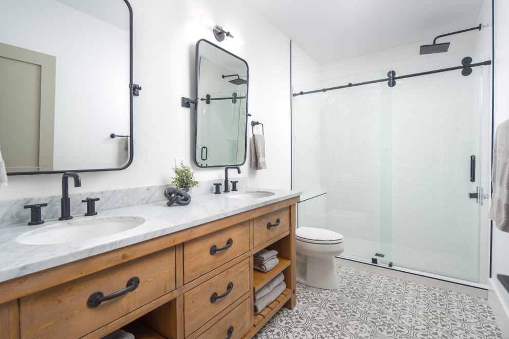 Transitional ceramic tile and double-sink doorless shower photo with a freestanding vanity