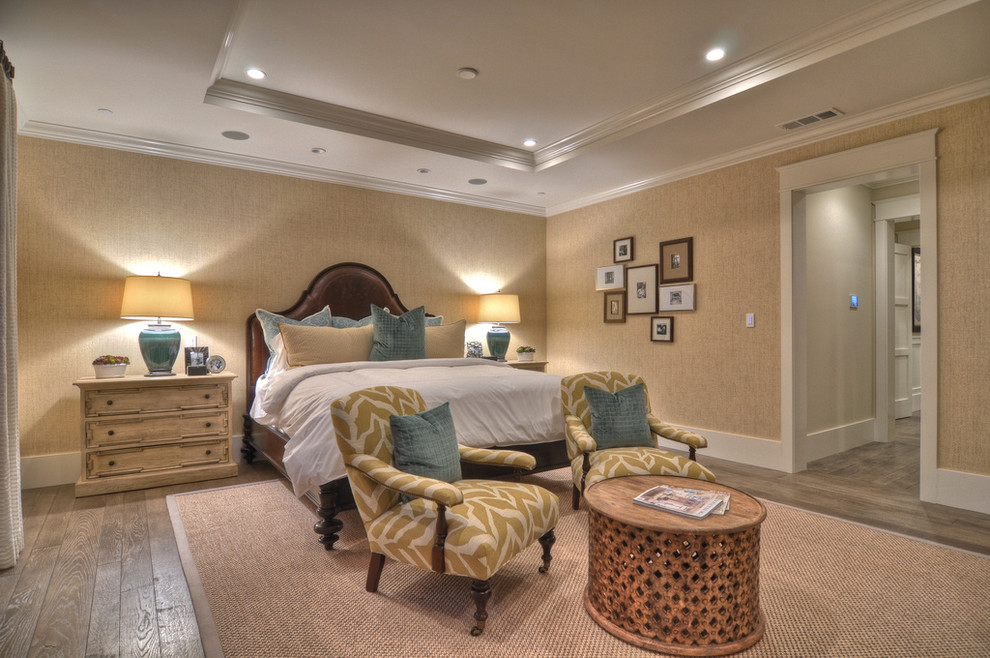Design ideas for a transitional bedroom in Orange County with beige walls.