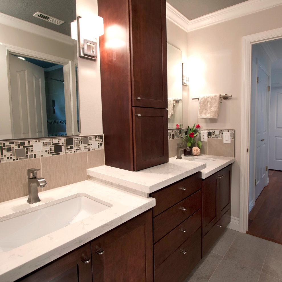 Photo of a mid-sized transitional kids bathroom in San Francisco with shaker cabinets and medium wood cabinets.