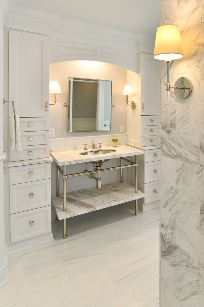 Inspiration for a large transitional master bathroom in DC Metro with gray tile, porcelain tile, a console sink, beige floor, grey benchtops and a built-in vanity.