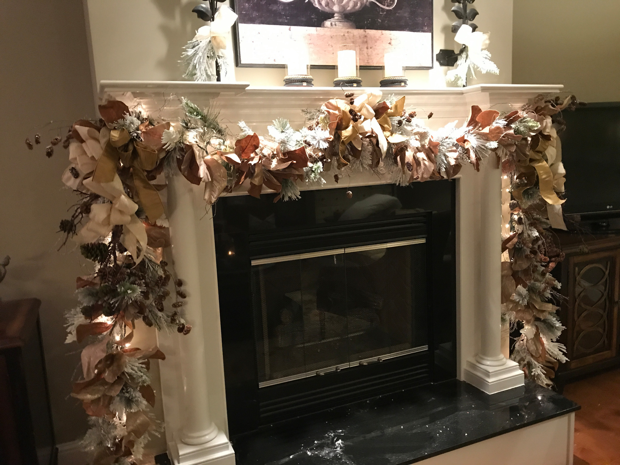 Mantle in Traditional home decked out for Christmas