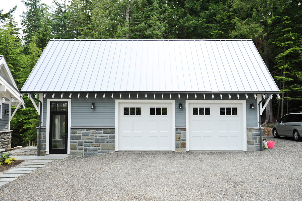 Photo of a transitional detached garage in Vancouver.