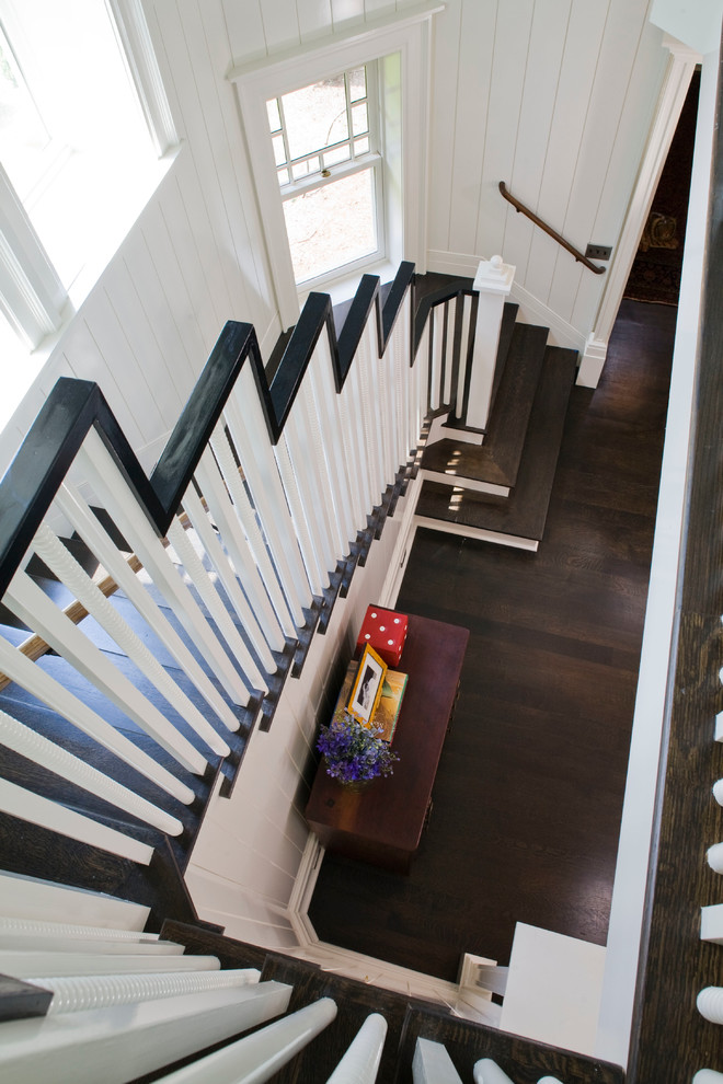This is an example of a transitional wood staircase in New York.