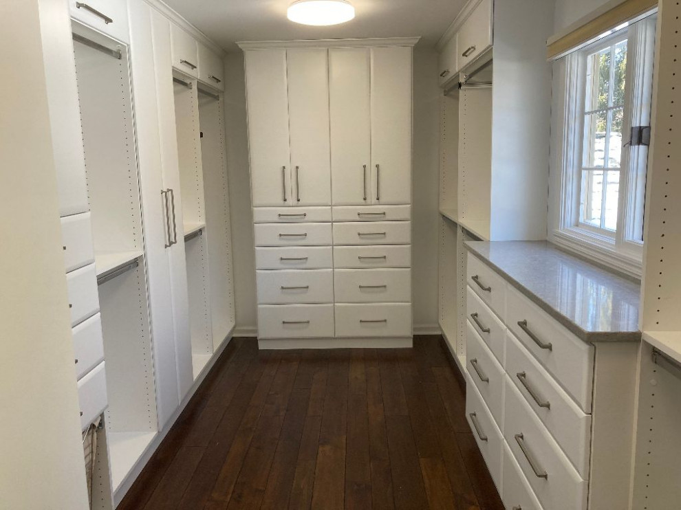 Inspiration for a classic wardrobe in Indianapolis with raised-panel cabinets and white cabinets.