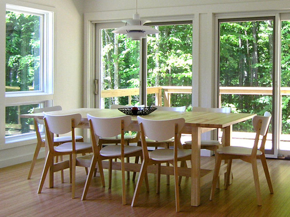 Mid-sized transitional light wood floor dining room photo in Burlington with white walls and no fireplace