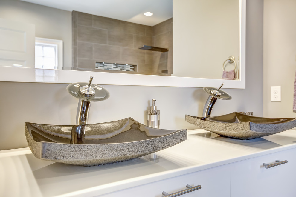 Photo of a large contemporary master bathroom in Other with flat-panel cabinets, white cabinets, grey walls, vinyl floors, a vessel sink and solid surface benchtops.