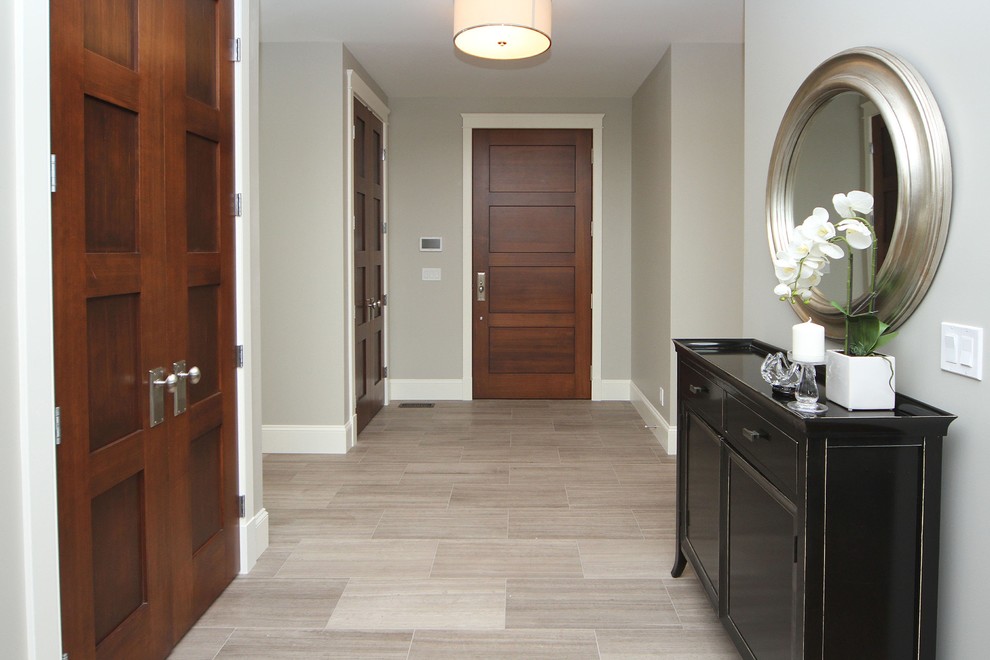 Inspiration for a transitional entryway remodel in Calgary
