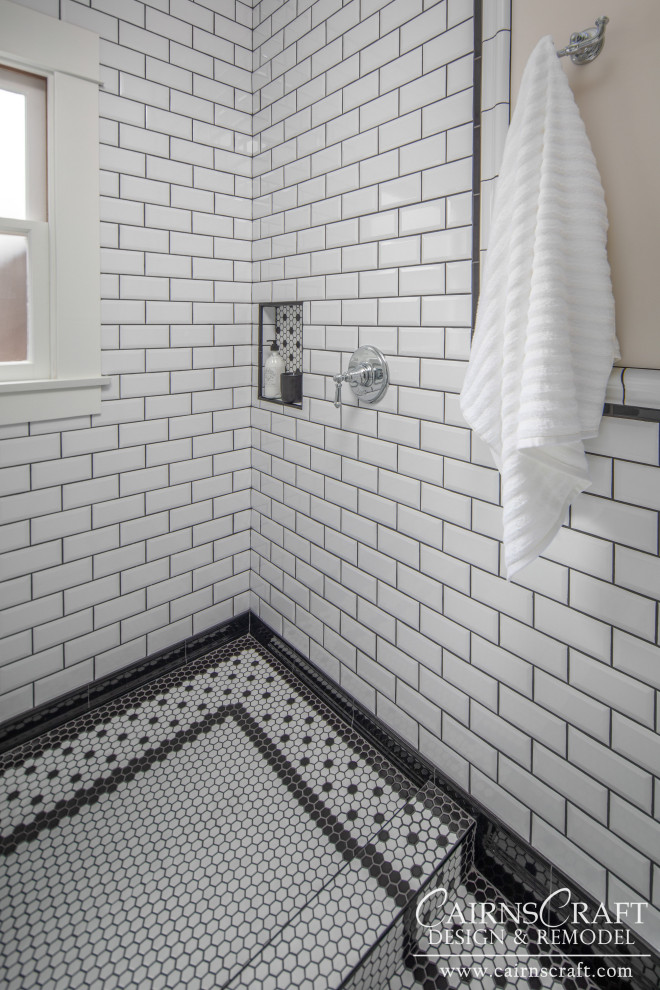 Design ideas for a small classic shower room bathroom in San Diego with a walk-in shower, a two-piece toilet, black and white tiles, metro tiles, white walls, mosaic tile flooring, a wall-mounted sink, white floors, an open shower, a wall niche, a single sink and wainscoting.