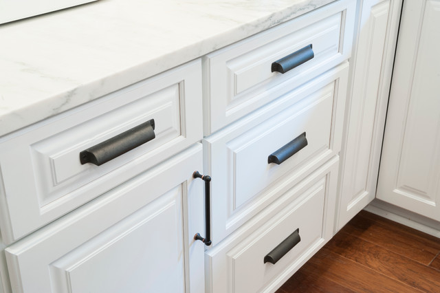 White Raised Panel Cabinets With Oil Rubbed Bronze Hardware
