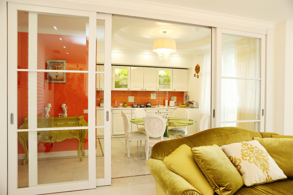 This is an example of a mid-sized contemporary u-shaped separate kitchen in Moscow with raised-panel cabinets, white cabinets, solid surface benchtops, orange splashback, ceramic splashback, porcelain floors and no island.