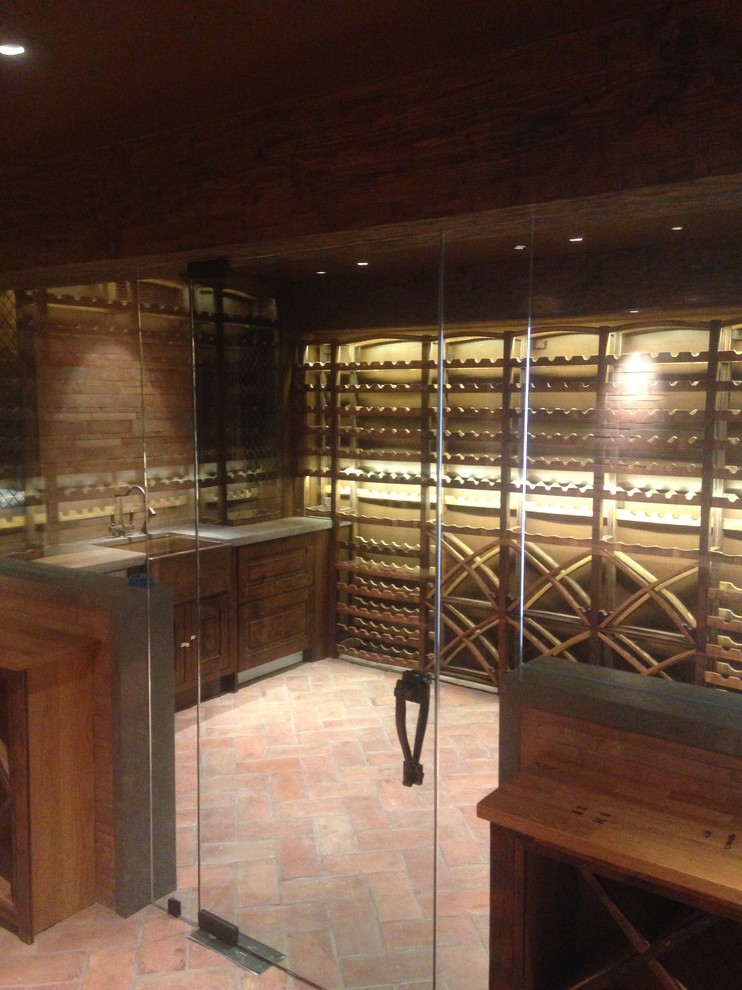 This is an example of a mediterranean wine cellar in Los Angeles.