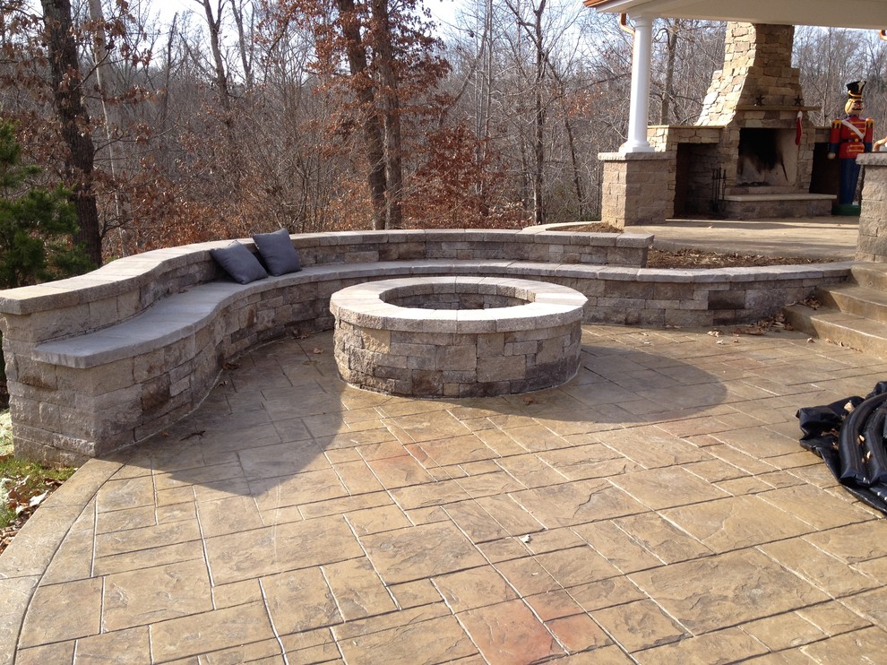 Small traditional backyard patio in DC Metro with a fire feature and concrete pavers.