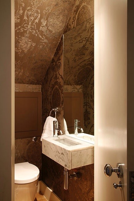 Inspiration for a contemporary powder room remodel in Dorset