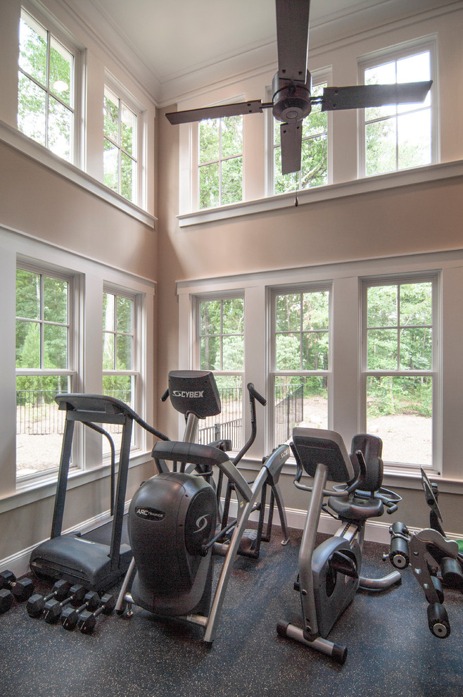 Photo of a mid-sized transitional multipurpose gym in Charlotte with beige walls and vinyl floors.