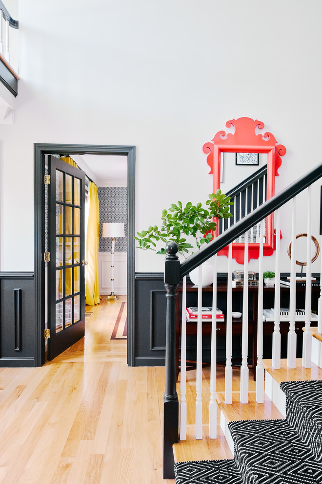 Large transitional light wood floor foyer photo in Providence with gray walls