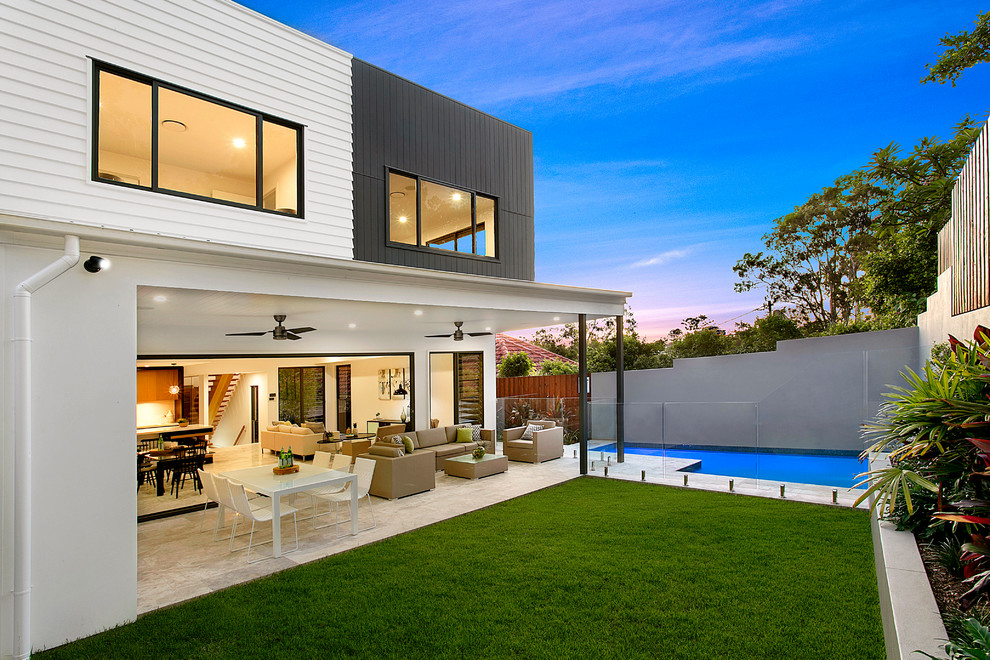 Contemporary exterior in Brisbane with mixed siding.