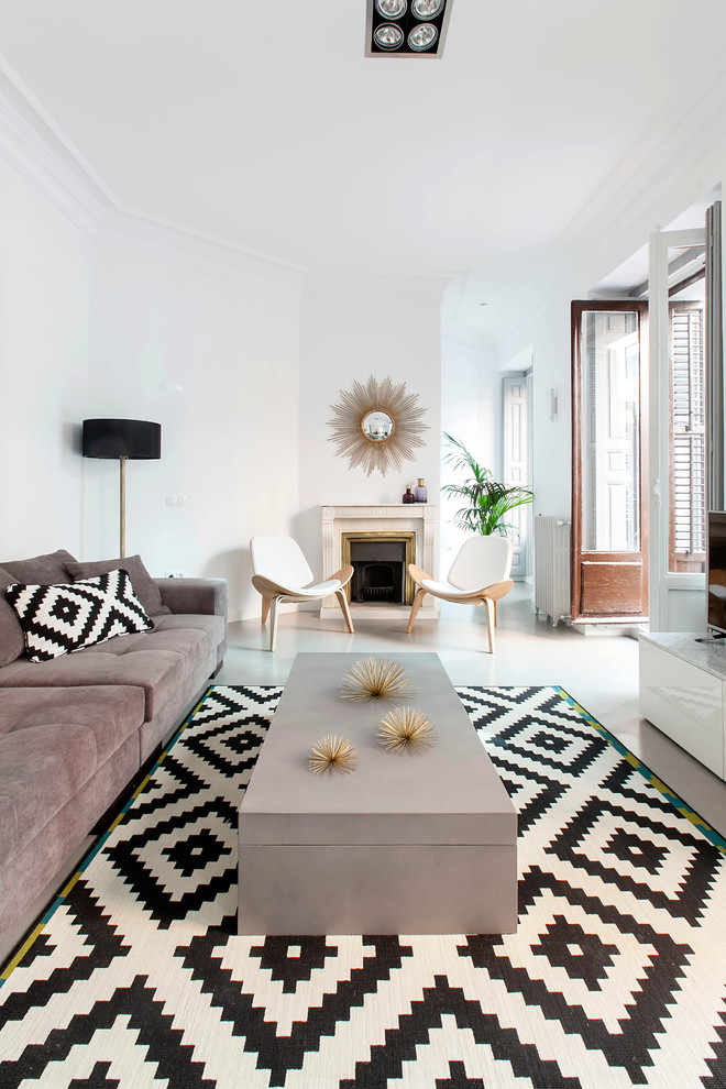 This is an example of a mid-sized eclectic formal open concept living room in Madrid with white walls and no fireplace.