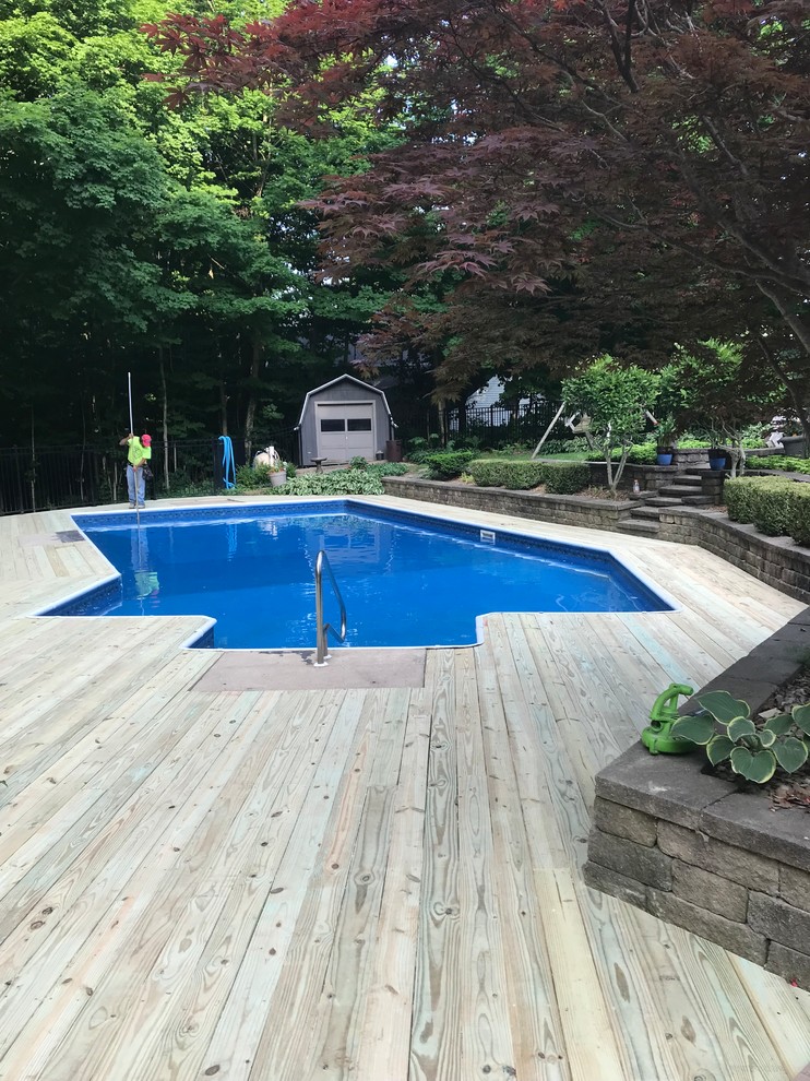 Huge backyard deck photo with no cover