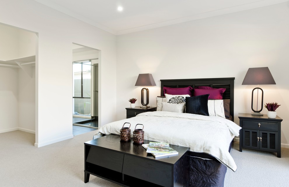 Inspiration for a mid-sized contemporary guest bedroom in Brisbane with white walls, carpet and no fireplace.
