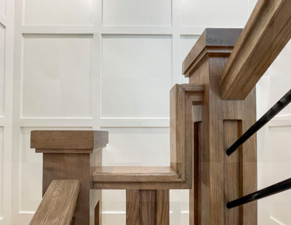 Ejemplo de escalera suspendida vintage grande con escalones de madera, contrahuellas de madera y barandilla de varios materiales