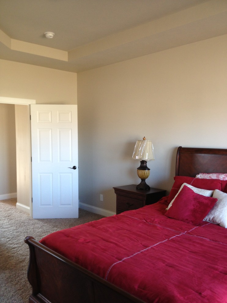 Inspiration for a craftsman master carpeted and beige floor bedroom remodel with beige walls