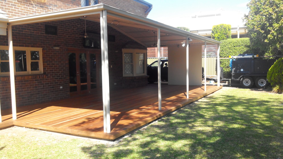 Photo of a mid-sized contemporary backyard deck in Adelaide.