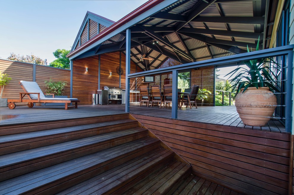 Photo of a large contemporary backyard patio in Adelaide with decking, a pergola and an outdoor kitchen.