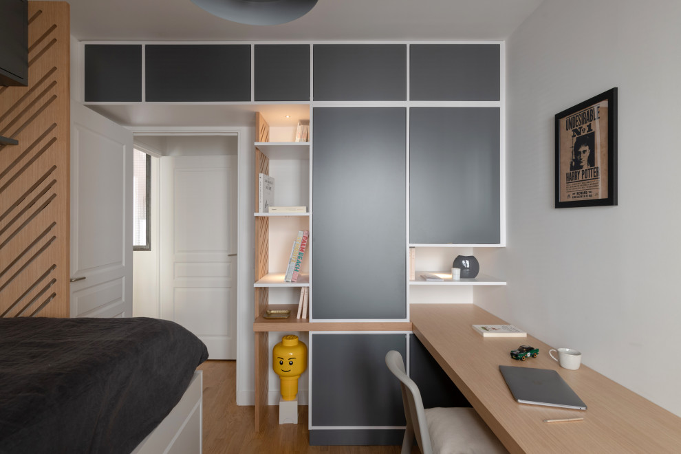 Design ideas for a mid-sized contemporary bedroom in Paris with grey walls.