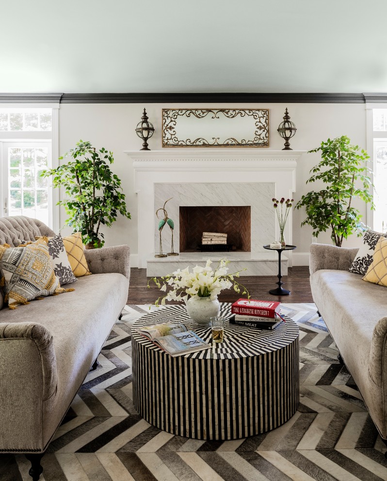 Inspiration for an expansive transitional formal open concept living room in Boston with grey walls, a standard fireplace, a stone fireplace surround, medium hardwood floors and a built-in media wall.
