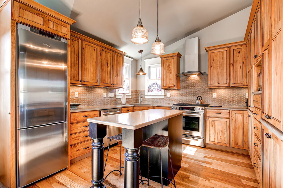 Inspiration for a traditional kitchen in Denver with stainless steel appliances.
