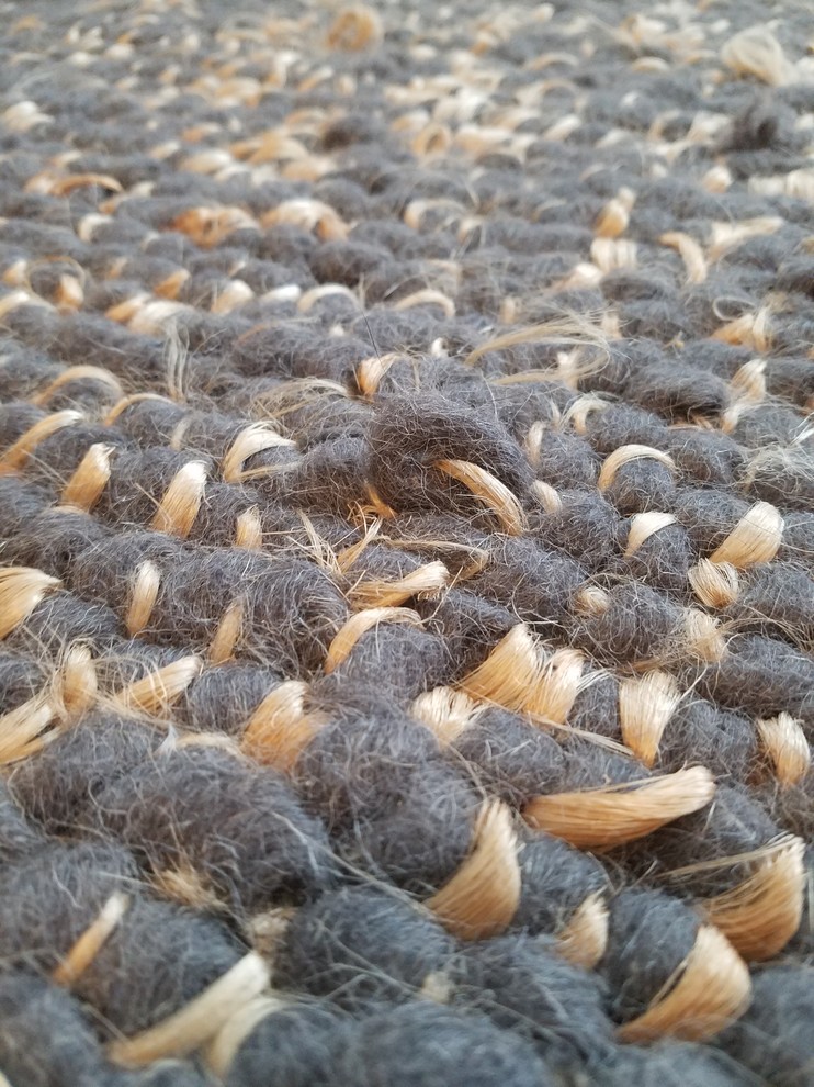 Wool rug normal or damaged?