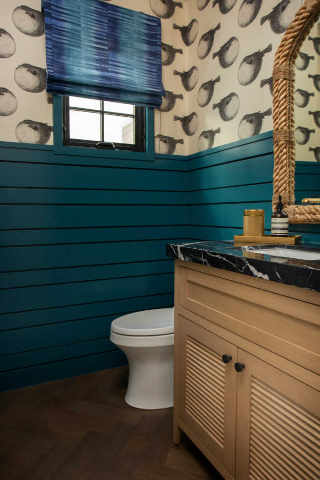 This is an example of a beach style powder room in Orange County.