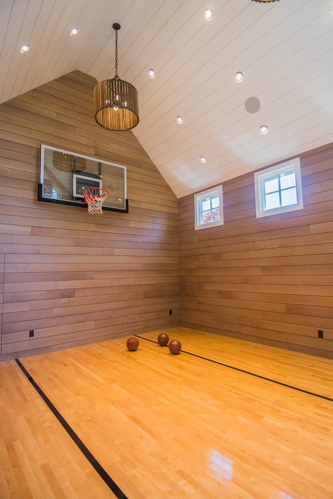 Photo of a transitional home gym in Boston.