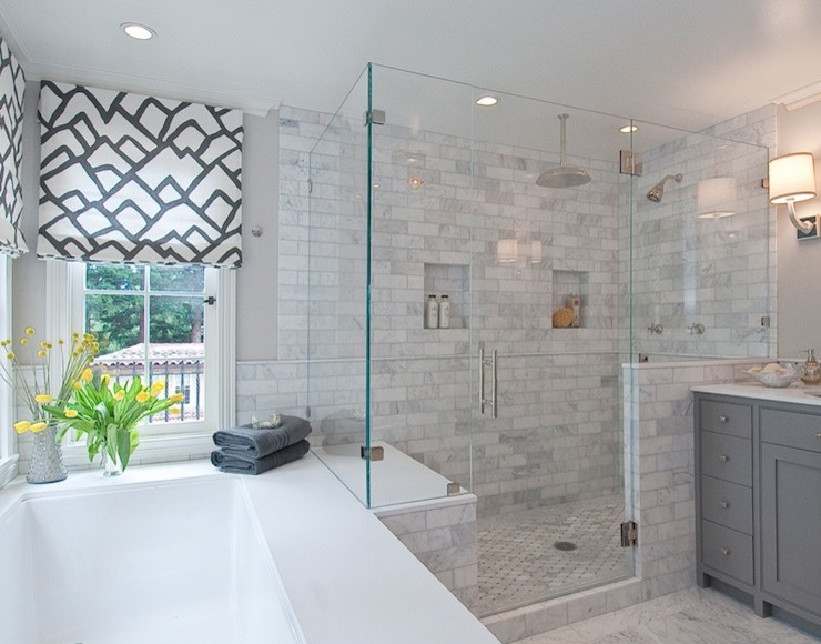 Design ideas for a large transitional master bathroom in Chicago with grey cabinets, a drop-in tub, an open shower, a one-piece toilet, gray tile, porcelain tile, grey walls, ceramic floors, a console sink, marble benchtops, shaker cabinets, multi-coloured floor and a hinged shower door.