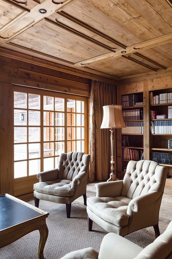 Example of a mountain style home design design in Denver