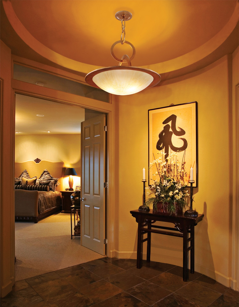 Photo of a traditional hallway in Miami with beige walls.