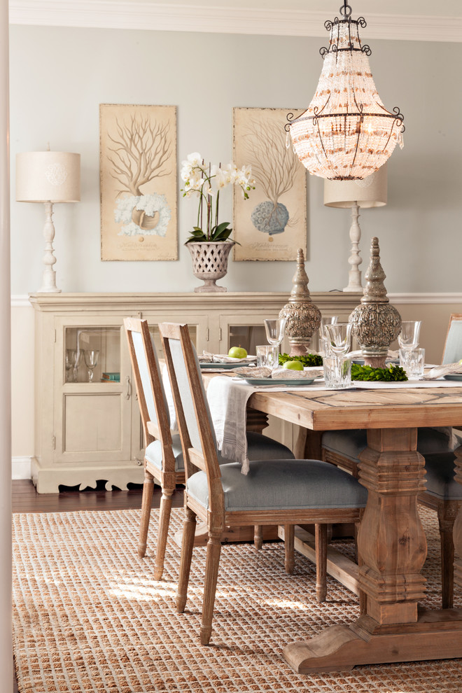 Photo of a mid-sized beach style dining room in Boston with beige walls, dark hardwood floors and no fireplace.