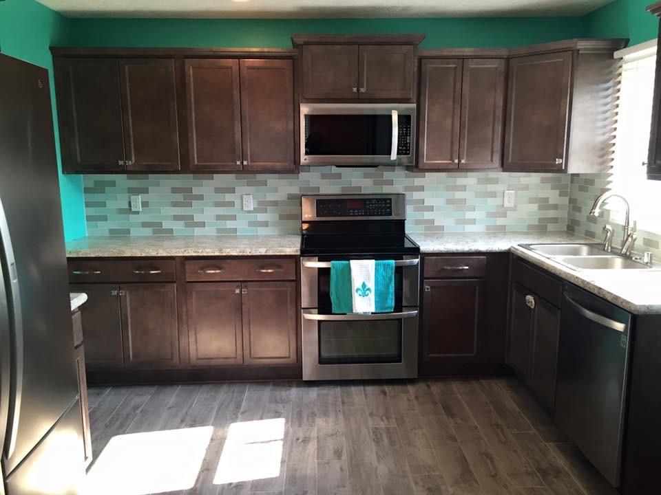 Example of a transitional kitchen design in Louisville