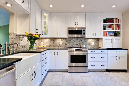 Large transitional white kitchen with pewter accents and hardware