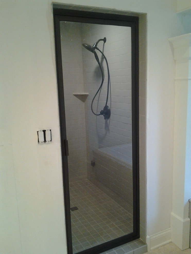 This is an example of a small contemporary bathroom in Indianapolis with engineered quartz benchtops, gray tile, cement tile, grey walls, ceramic floors and with a sauna.