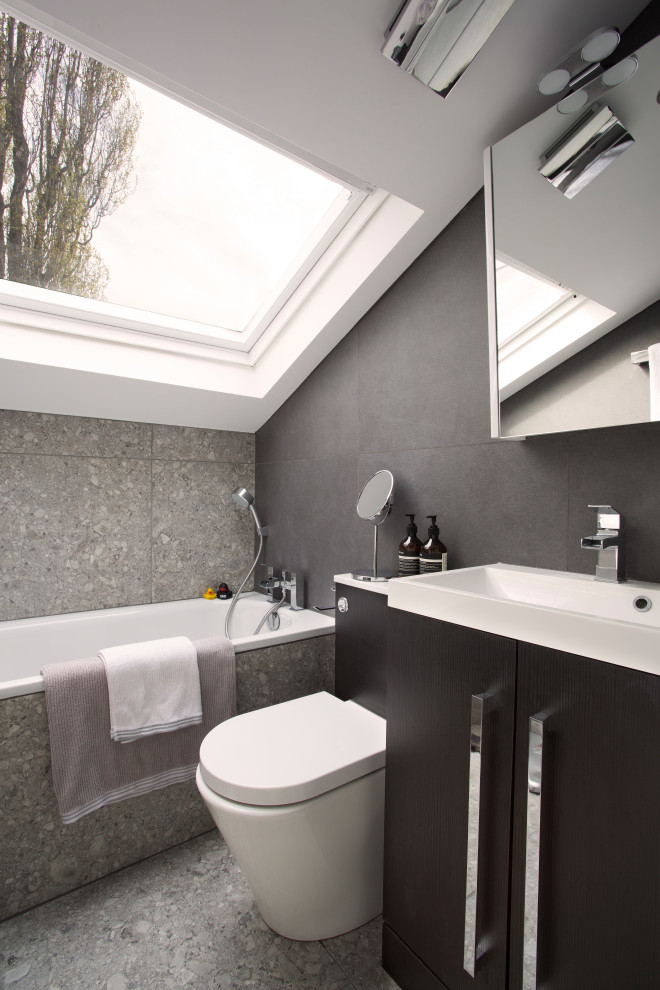 This is an example of a contemporary kids bathroom in Other with ceramic floors.