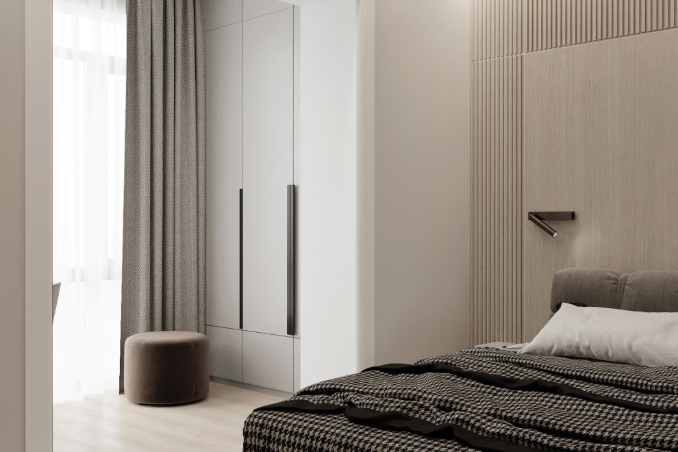Modelo de dormitorio principal contemporáneo de tamaño medio con paredes beige
