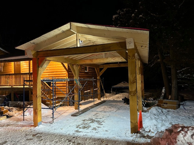 Log Siding, Stamped Concrete and Post and Beam Carport